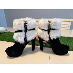 Black suede heeled boots with white fur